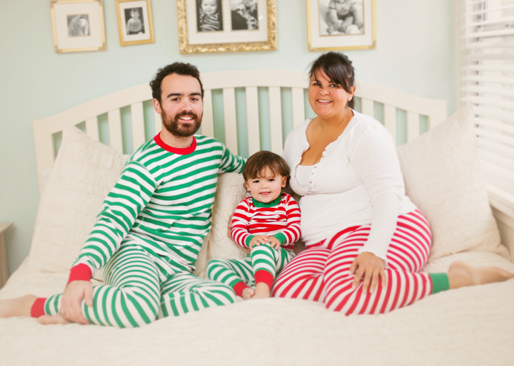 Santa Rosa family lifestyle photographer christmas card portrait child on bed in pajamas