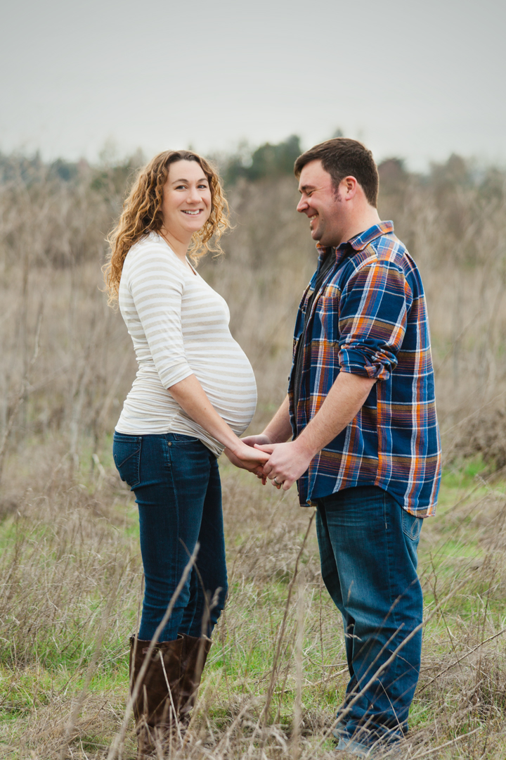 Santa Rosa maternity photographer photographs couple in laguna de santa rosa park in sonoma county